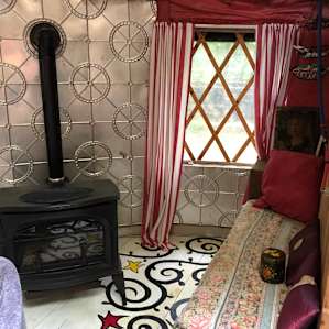 New gas stove runs on thermostat. Did good job of heating up the place on very cold nights.