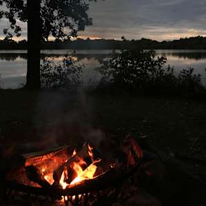 The campsite was well-stocked with a large fire pit, plenty of dry wood, and a grill plate for cooking over the fire.