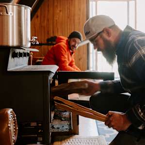 Warm yourself with the wood burning stove.