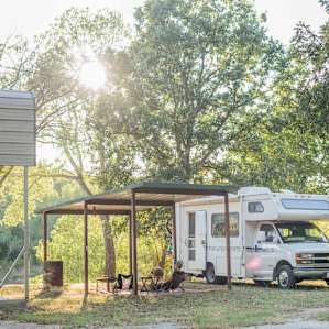 The RV site is level land it was so nice to have a covered picnic pavilion to set up in