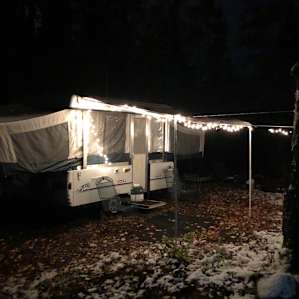 Very nice lit paths and lighting all around the camper, with a nice patio to boot!