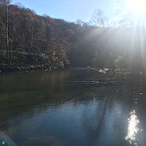 Where the rivers meet on the property, below the new railroad tracks