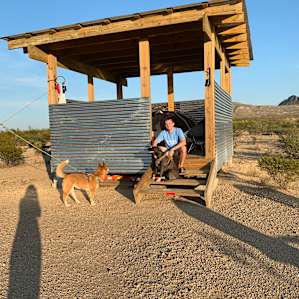 My husband and our pups! The weather was perfect but, the covering was the best escape from the sun