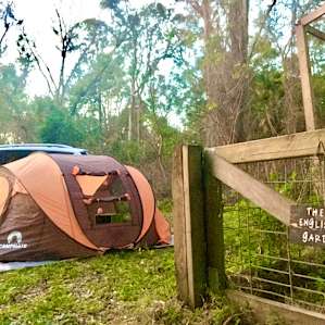 Kale yeah! Plenty of space to set up my tent near some trees and a veggie garden.