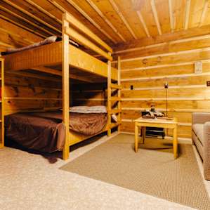 The bunk beds and living area in the cabin