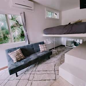 Tiny house in orchard