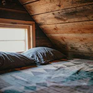 Super cozy bed in the loft area - easily fits 2.