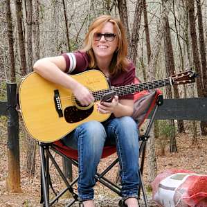 Picking and grinning while camping