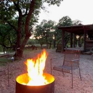 Fire at sunset at the rustic cabin