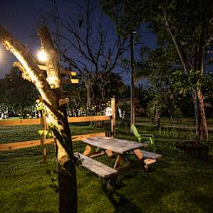 Picnic table and lawn chair in lot 1