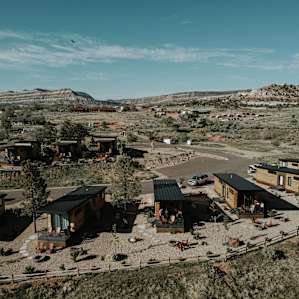 A view of the compound from above. The lower houses accommodate 4 guests and the upper houses accommodate 6 guests (you can see their little loft on the top).
