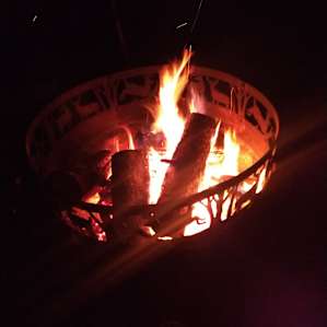 Fire pit adjacent to the pond where we cooked dinner and kept warm at night