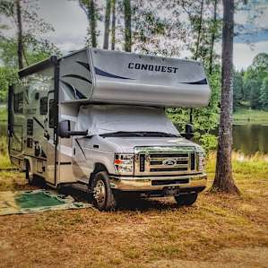 RV camping on seven acre pond