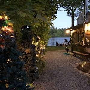 Camp all lit up at night.