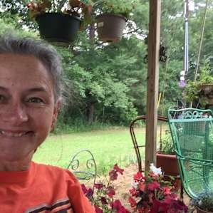 Sitting in the produce stand.