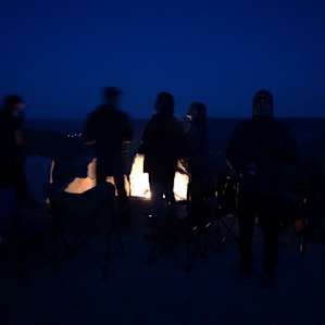 Standing around the fire admiring the view and the vast amount of shining stars