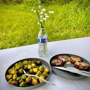 Gourmet meals on a hot campfire with local splendor on the table. Perfect.