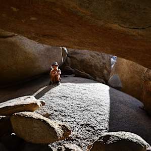 Taking in the magnitude of these massive boulder caves.