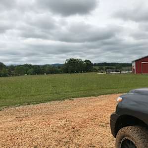 View near barn, campsites behind
