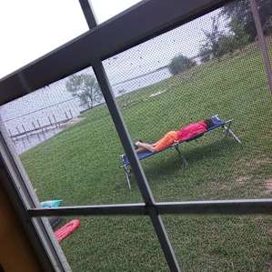 Kids suntanning on the hammock
