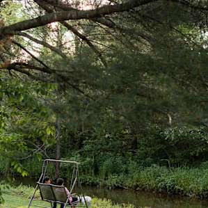 We loved the swinging bench right by the brook