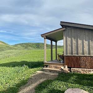 True luxury. Our favorite spot to watch the sunset on the cabin porch.