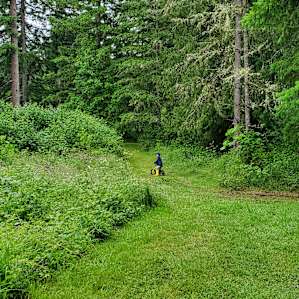 My son riding his bike on some of the trails around camp.