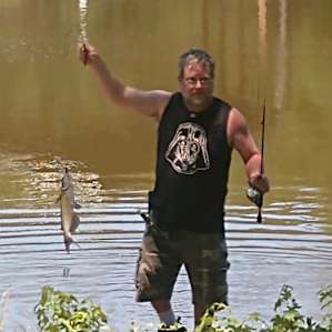 RV camping on seven acre pond