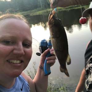 RV camping on seven acre pond