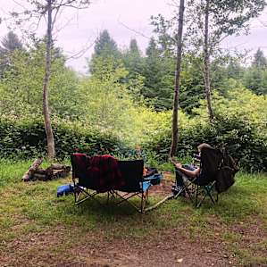 Sitting around the campfire.