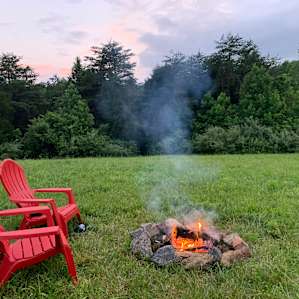 Enjoying a campfire at Big Dipper Ranch.