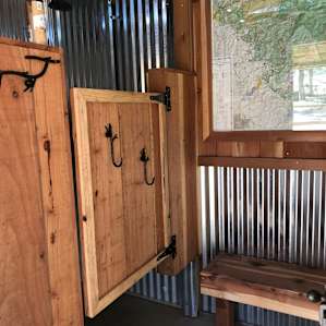The shower! Nice size bench/changing area, towel hooks, and a seat inside the shower itself!