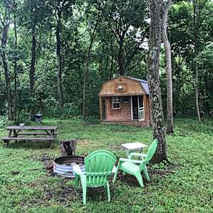 Guthrie Meadows green door cabin