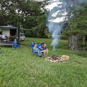 Sitting around the campfire. Let's make smores!