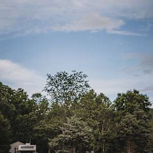 Perfect RV site tucked among the shady trees