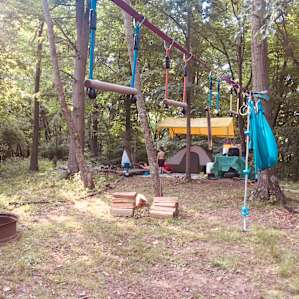 Camping under the trees kept us cool and we prepared for the rain