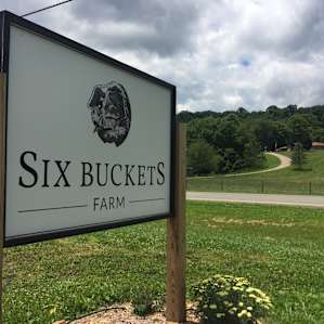 The drive up the hill is across the street from their sign.