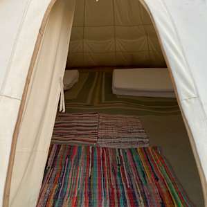 Peeking inside Bear Tipi