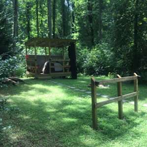 Parking space near the platform that is for tents and hammocks.