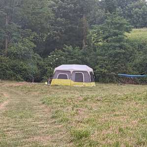 Tent Camping by a Stream