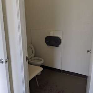 Separate room with toilet inside full bathroom,