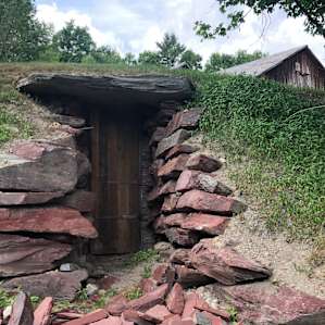 Heather showed us at the farm, that they're working on a root cellar built into the hill!