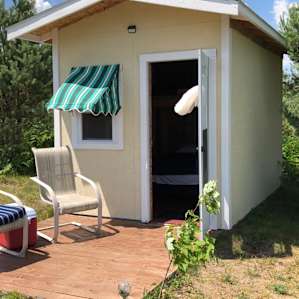 Wood cabins or tent sites.