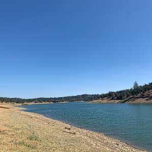 The shore of the lake. Don’t forget your water shoes!