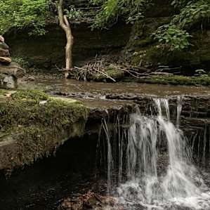 There is a beautiful waterfall at the creek. You can walk the creek for a nice cool-off.