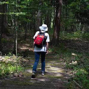 My boyfriend following the walking trail down to the "swimmin' hole"