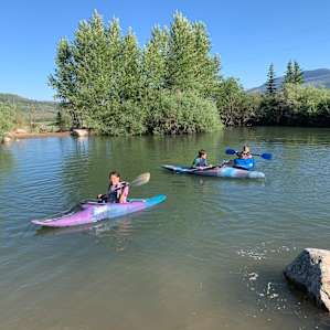 The kids loved kayaking in the little pond. Jon was very generous in letting the kids use them. He also offered to lend us his paddles and life vests for our rafting trip