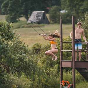 The trapeze for splashing into the pond!