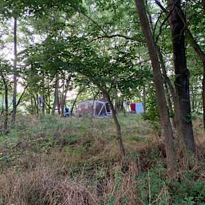 There are two tent sites. This one (to the right of the parking field) had lots of open space for our large tent plus a hammock and table. The other was more charming and cozy, but better for a small/average sized tent.