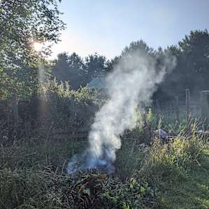 Michael and Kelly were clearing out some brush when we arrived and started a fire pit for all to enjoy.